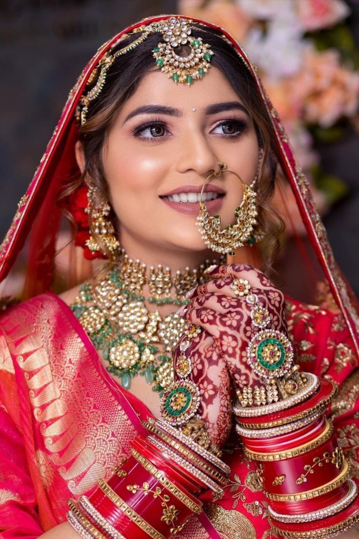 Bride looking at the mirror after makeup